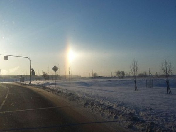 Необычное явление гало заметили в небе над городом